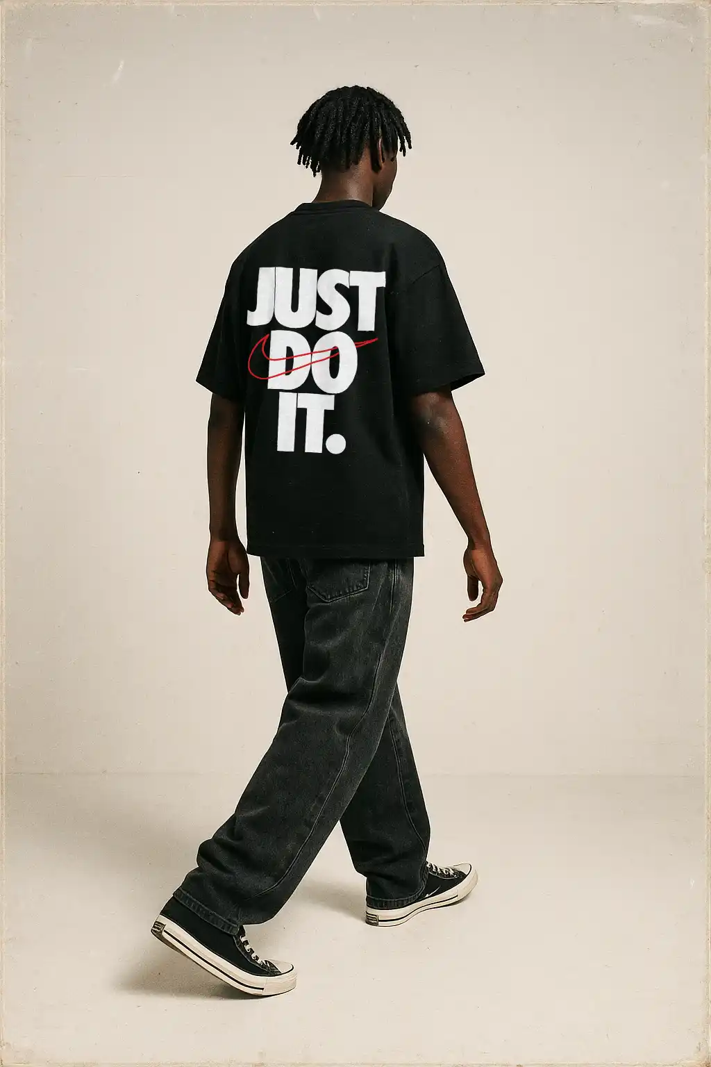 Mockup222 - Mock It AI Man wearing a 'Just Do It' t-shirt and jeans.