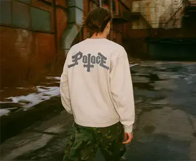 Black t-shirt with NECK DEEP in yellow, POP PUNK in red.