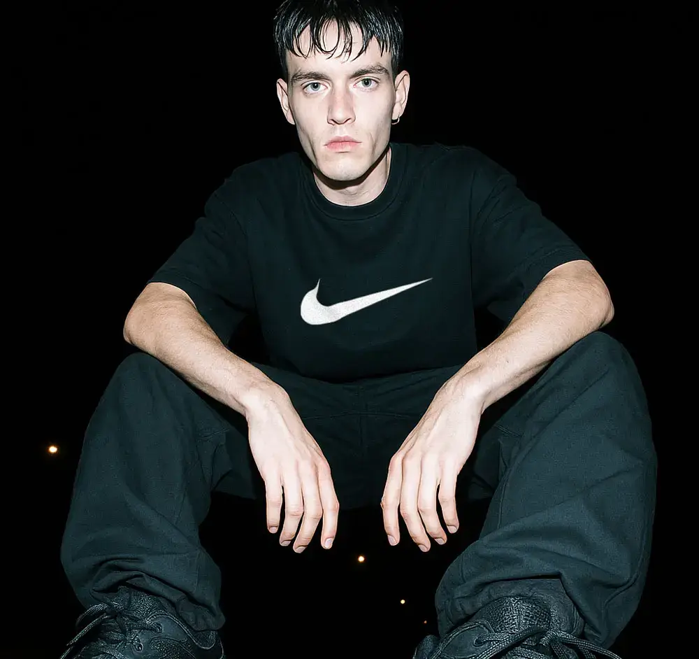 Man wearing a Nike t-shirt.