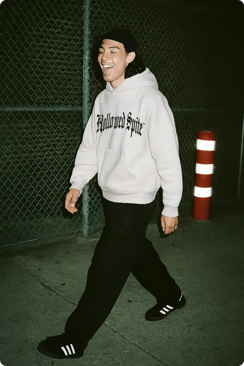 White hoodie walking fashion mockup