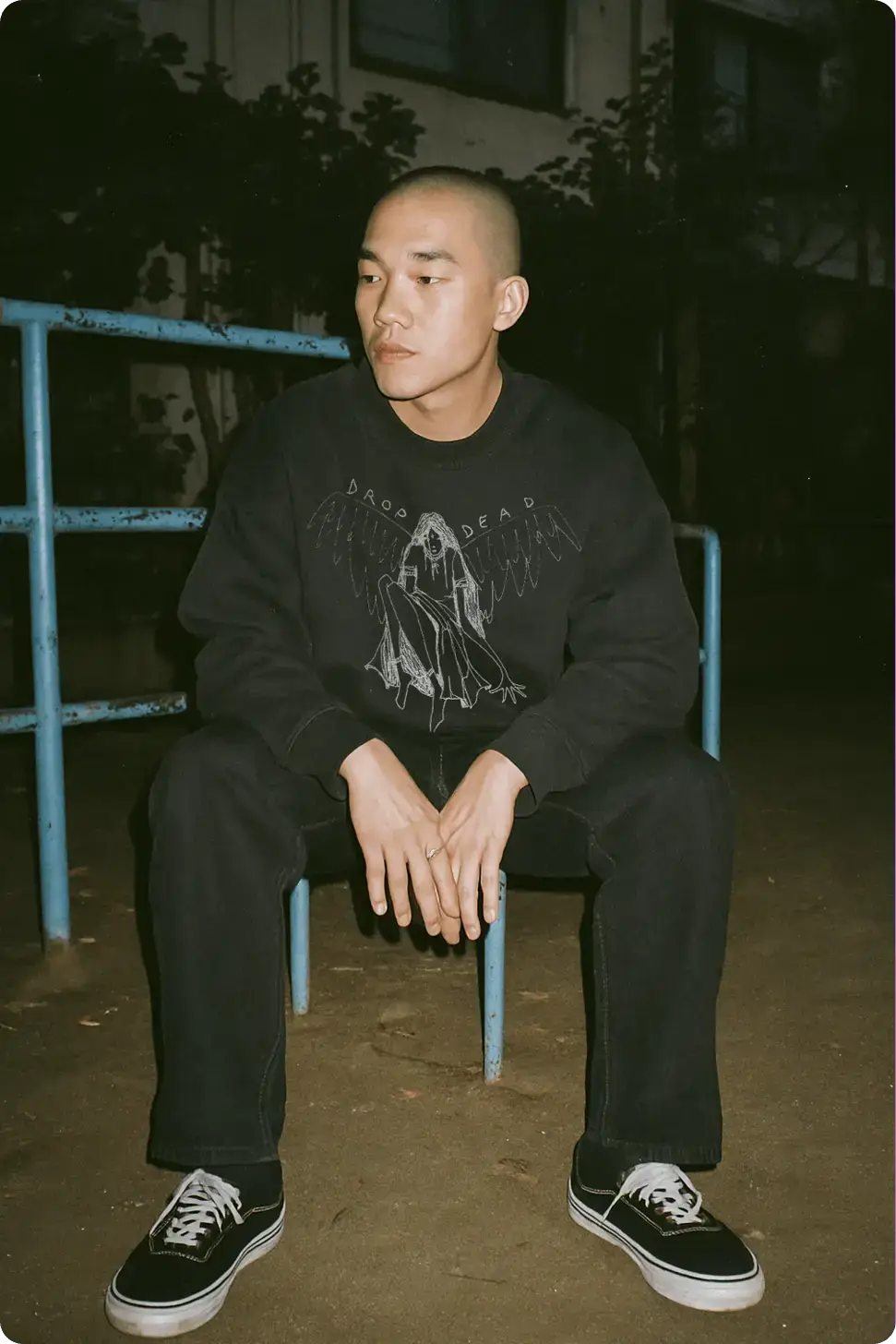 Black sweatshirt seated fashion mockup